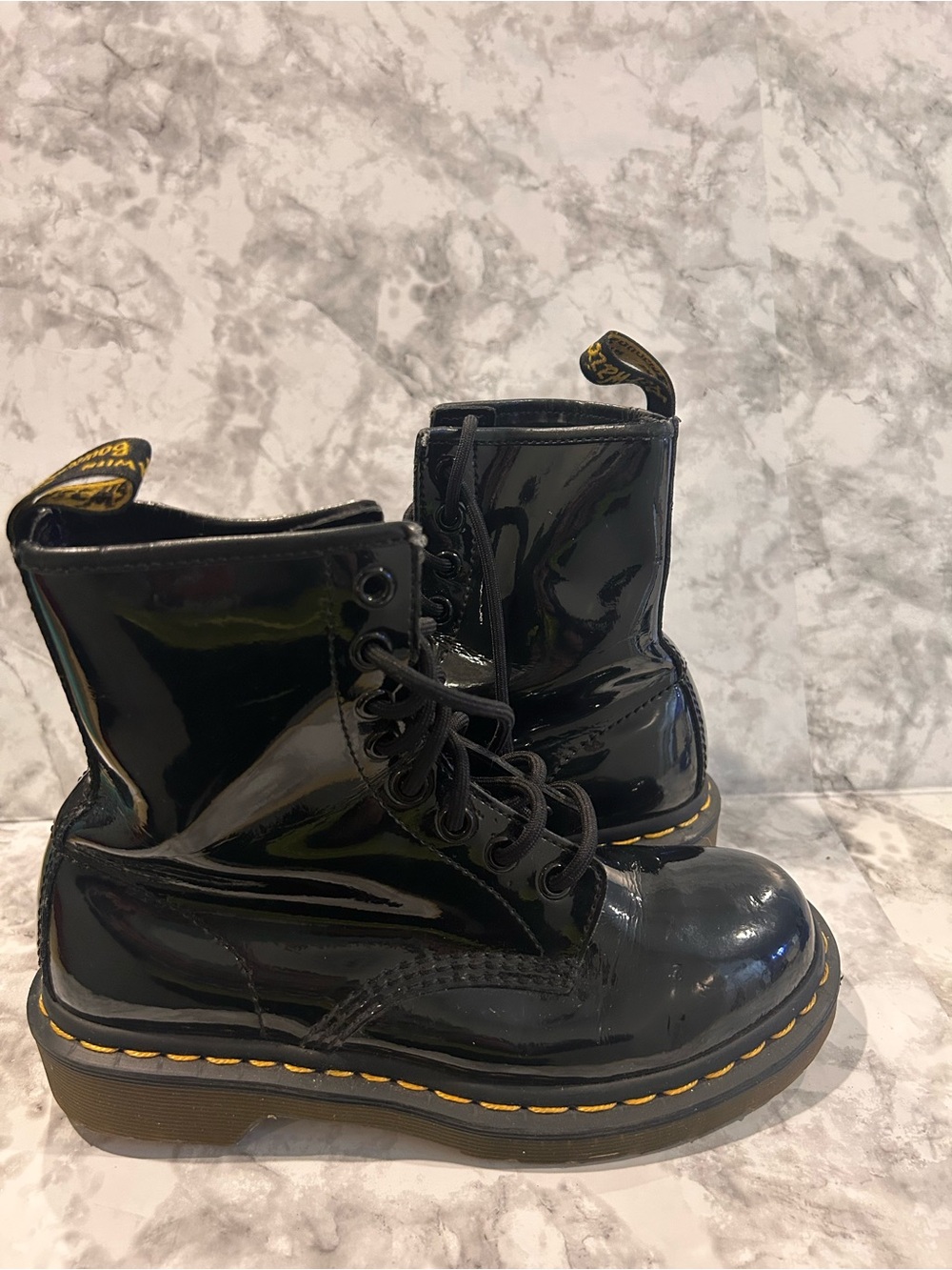 Dr. Martens Black Patent Lace-Up Boots with Yellow Stitching